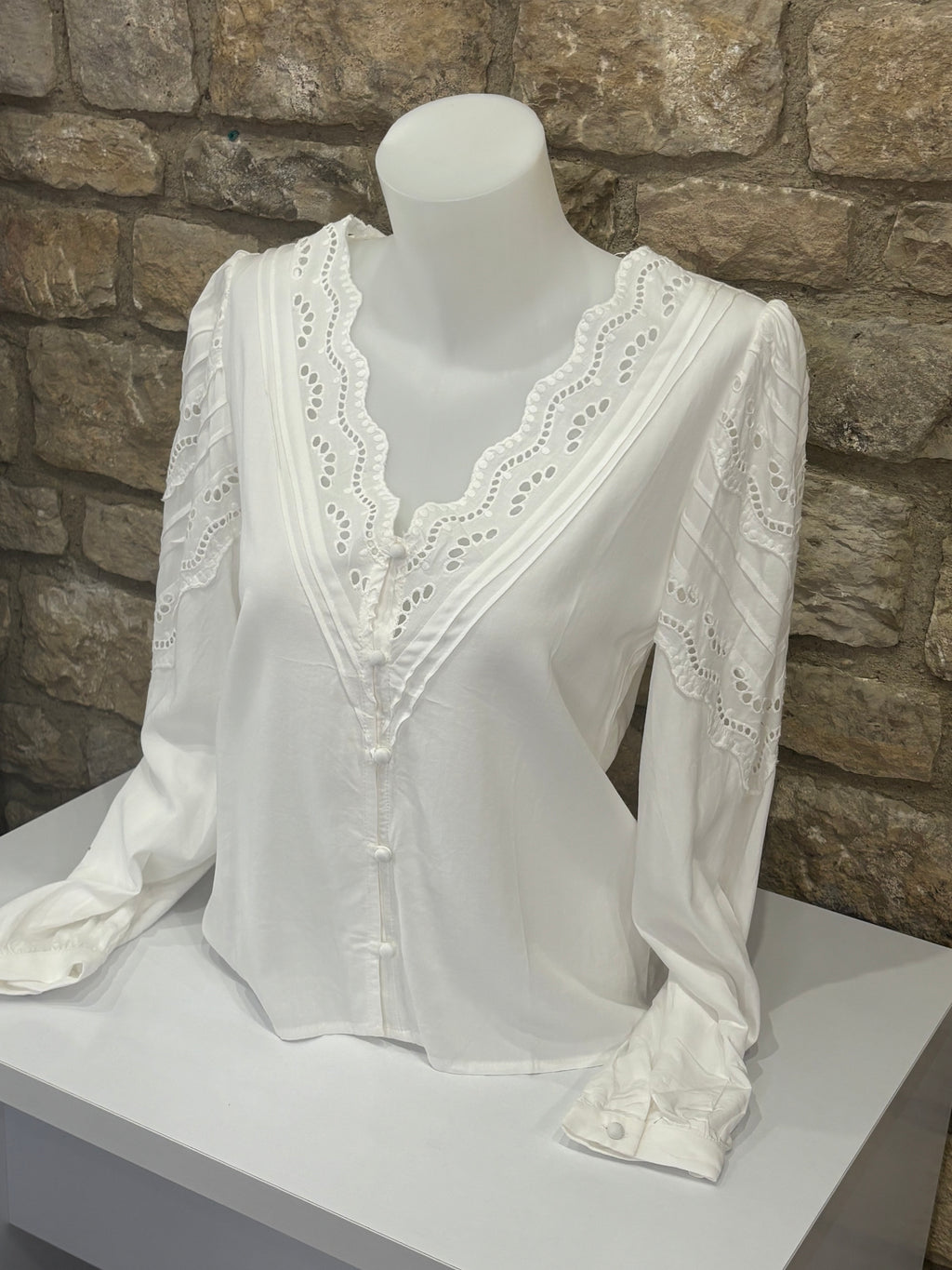 Blouse boutonnée V profond