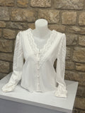 Blouse boutonnée V profond